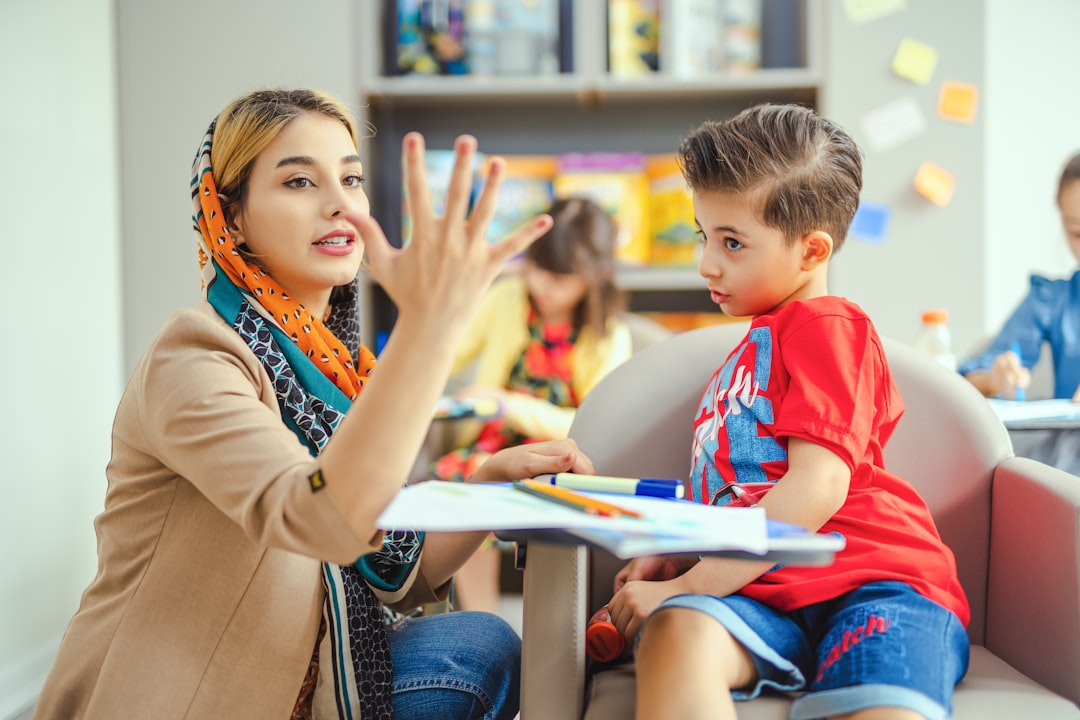 Preschool teacher with children in classroom