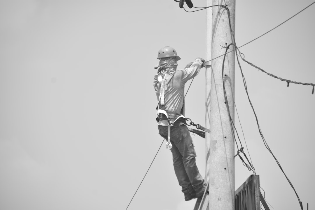 Field technician working on power lines