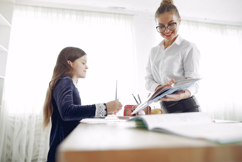 Teacher helping student