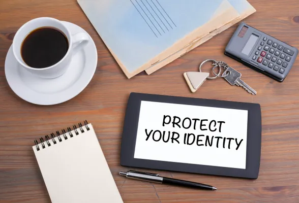 Tablet on a desk representing brand protection and identity safety